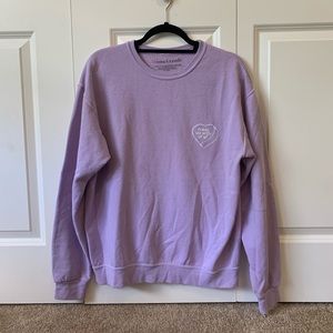 Ariana Grande purple sweater merch